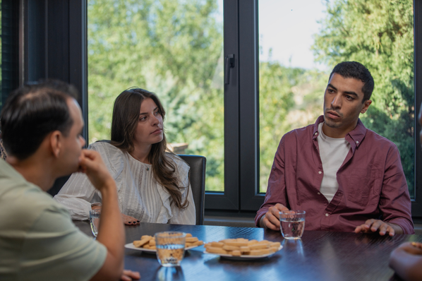 Manager demonstrating emotional intelligence in workplace conversation